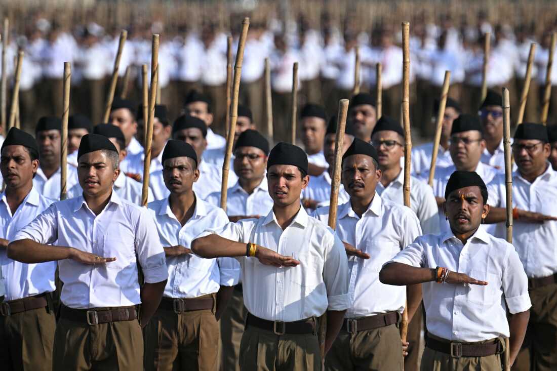 Rashtriya Swayamsevak Sangh (RSS) volunteers take part in the Hindu nationalist organization's centenary celebrations at Reshimbagh Ground in Nagpur on October 2, 2025.
