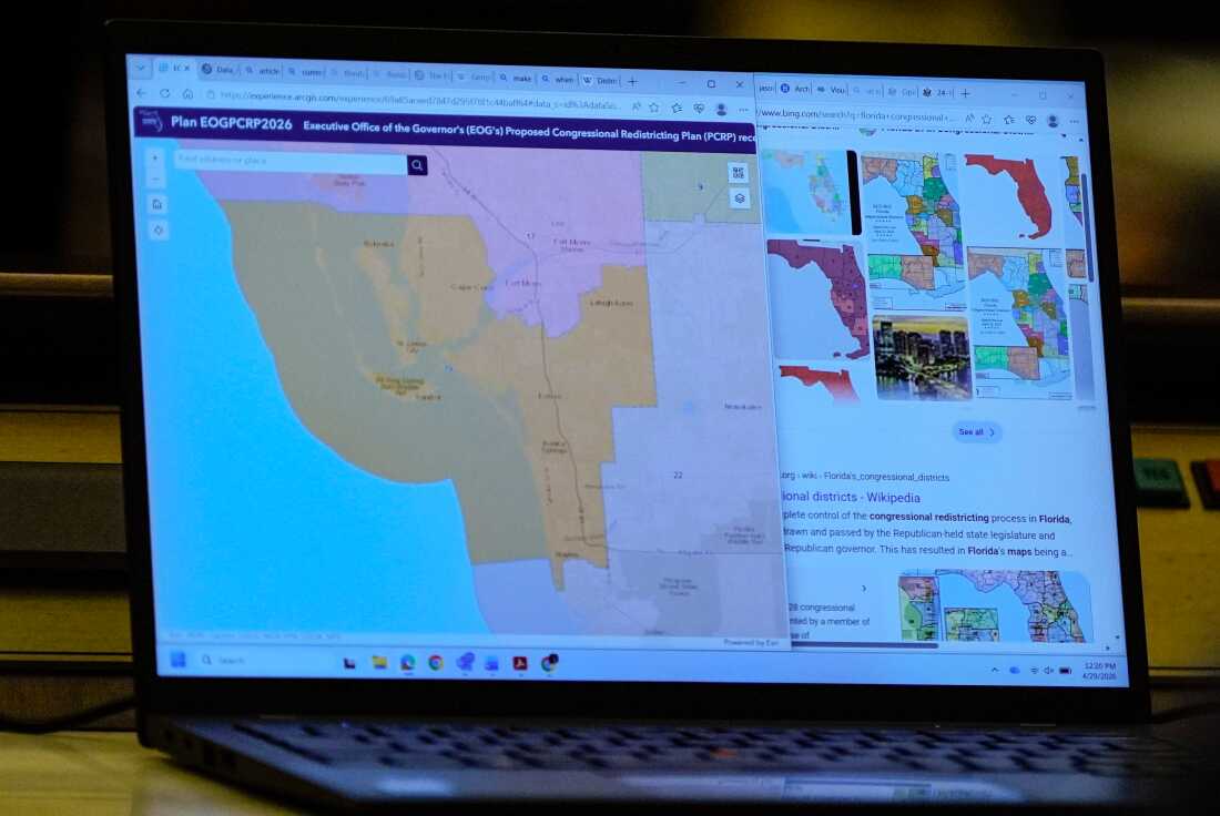 A senator's laptop displays a congressional redistricting plan during debate before its passage in the Florida Senate.