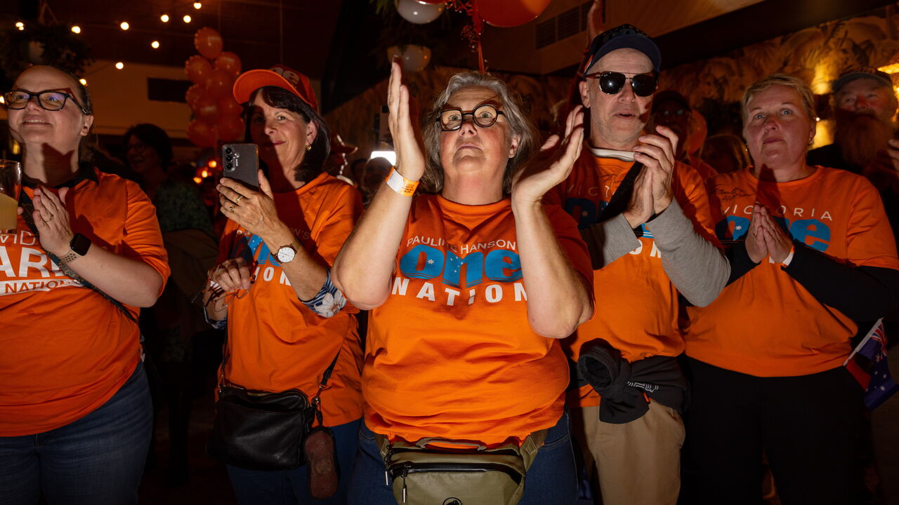 One Nation supporters celebrate as their party wins the Farrer by-election on May 9, 2026 in Albury, Australia.