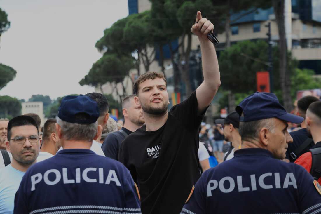 Police officers block a street during a demonstration in Tirana, Albania, Wednesday, June 3, 2026, opposing a luxury coastal development project linked to Jared Kushner and Ivanka Trump over concerns about environmental impacts and transparency.